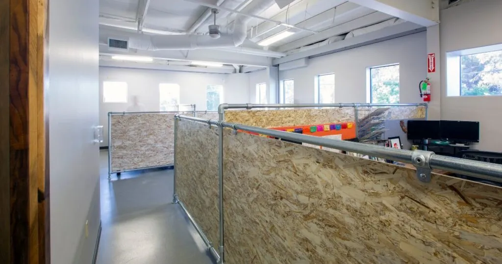 A project built for Kleen Kanteen, made using sustainable practices in construction, including recycled wood for 3 office cubes, and windows for natural lighting.