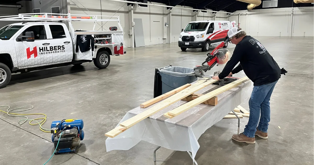 Hilbers Construction worker using sustainable materials.