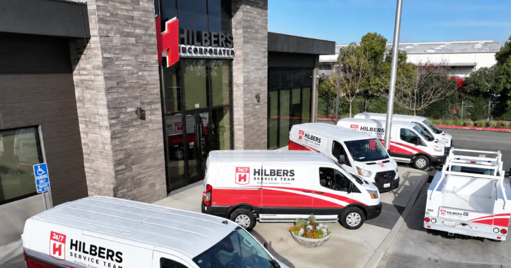Hilbers Service Team vans parked outside the Hilbers Incorporated office in Yuba City, California.