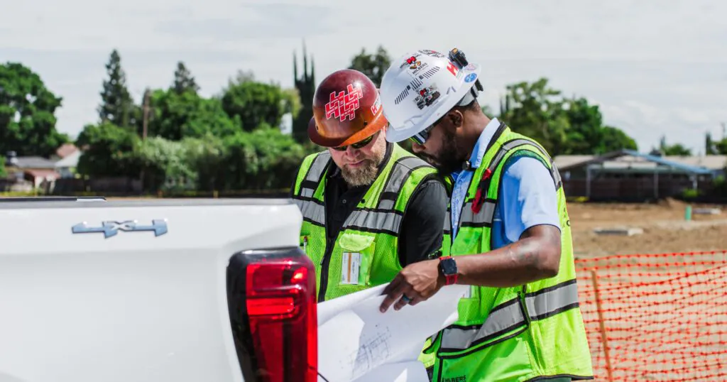 Hilbers construction team reviewing plans.