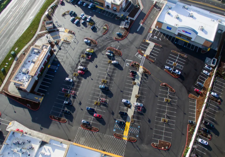 An aerial view of a completed shopping center highlighting our 2023 achievements