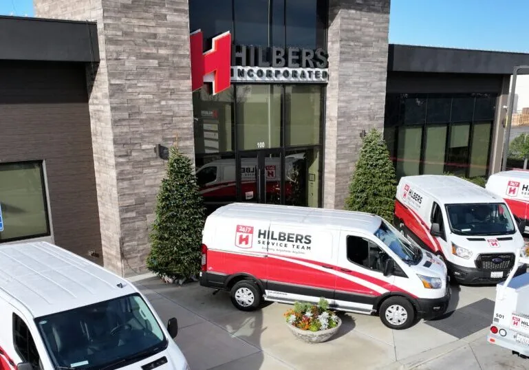 Hilbers' commercial maintenance team and service trucks prepared to provide commercial maintenance services across California.