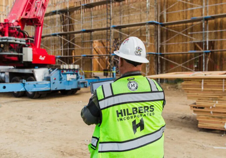 Commercial construction crew on a jobsite supporting multi-state construction management